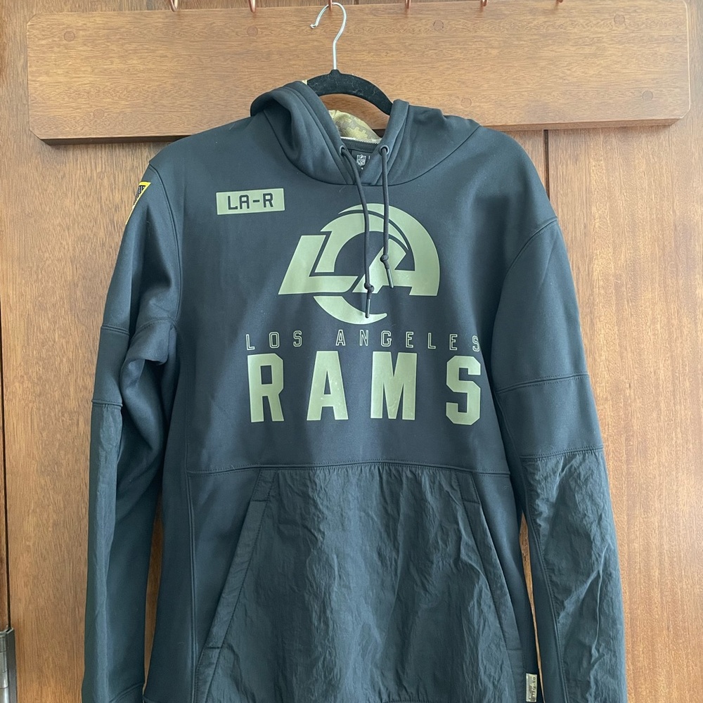 Mens Rams sweatshirt size medium, NFL & Nike logo. Navy print hood. Almost new